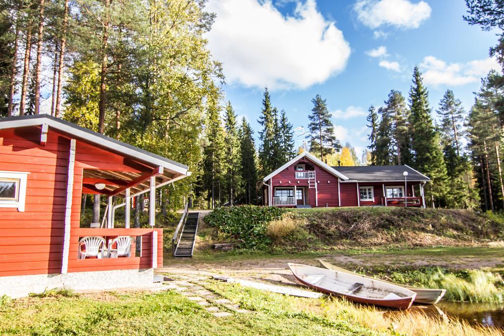 Lomaperkkioe Cottages Каяані Номер фото